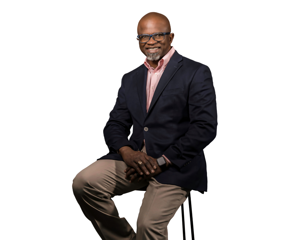 Dr. Charles Dent seated on a stool